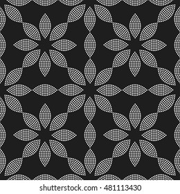 Tiled seamless pattern of dotted flowers. Abstract black and white mosaic background. Vector illustration.