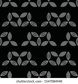 Tiled seamless pattern of triangular shapes of dotted petals grouped by three. Abstract black and white mosaic leaf background. Vector illustration.