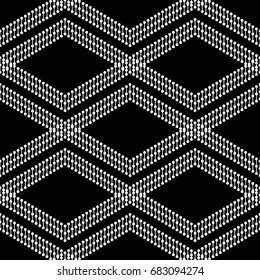 Tiled seamless zigzag pattern. Wavy ornament of dotted chevrons. Abstract black and white background. Vector Illustration.