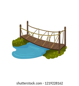 Timber bridge with rope railings. Small wooden footbridge over blue river. Cartoon landscape element. Flat vector design