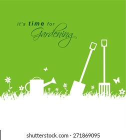 It's time for gardening. Spring gardening background with spade, rake and watering can