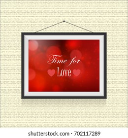 Time for love - love inscription template in photo frame hanged on the wall
