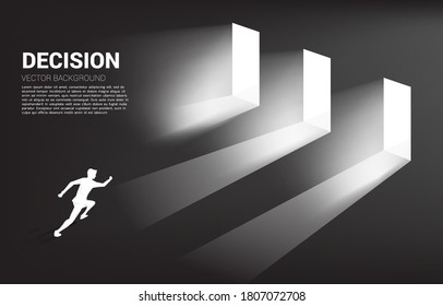 time to make decision in business direction. Silhouette of businessman running to select door to enter