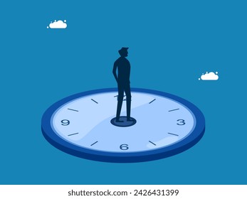 Time management. confident man stands on the clock 