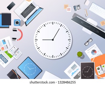 Time management deadline business timing concept top angle view desktop laptop smartphone tablet screen clock paper documents office stuff horizontal