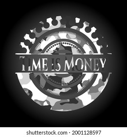 Time is Money written on a grey camo texture 