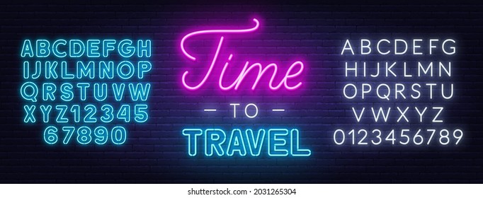 Time to travel neon lettering on brick wall background.