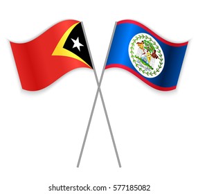 Timorese and Belizean crossed flags. East Timor combined with Belize isolated on white. Language learning, international business or travel concept.