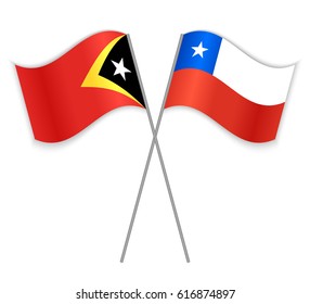 Timorese and Chilean crossed flags. East Timor combined with Chile isolated on white. Language learning, international business or travel concept.