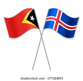 Timorese and Icelandic crossed flags. East Timor combined with Iceland isolated on white. Language learning, international business or travel concept.