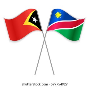 Timorese and Namibian crossed flags. East Timor combined with Namibia isolated on white. Language learning, international business or travel concept.