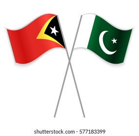 Timorese and Pakistani crossed flags. East Timor combined with Pakistan isolated on white. Language learning, international business or travel concept.
