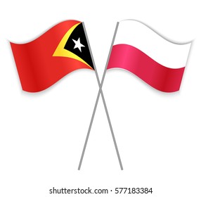 Timorese and Polish crossed flags. East Timor combined with Poland isolated on white. Language learning, international business or travel concept.