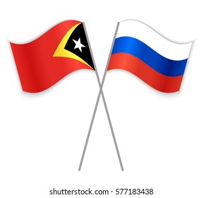 Timorese and Russian crossed flags. East Timor combined with Russia isolated on white. Language learning, international business or travel concept.