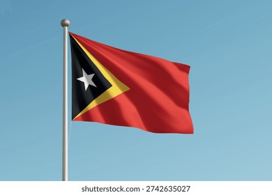 Timor-Leste National Flag on Flagpole Clear Sky