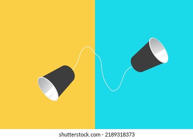 Tin can phone on yellow and blue paper backgrounds. concept of direct business