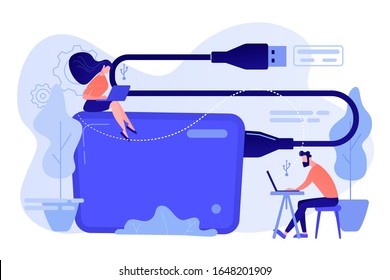 Tiny business people at laptops using portable external hard drive. External hard drive, data storage device, external storage hdd concept. Pinkish coral bluevector isolated illustration