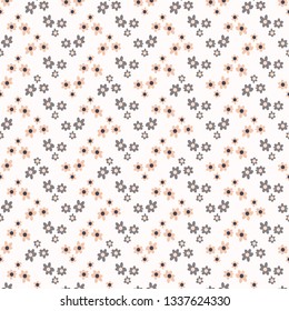 Tiny flower blossom sprinkles seamless pattern. Pretty fashion print vector illustration. Repeatable floral wallpaper tile . Hand drawn modern alloverprint home decor background. Pink, grey, white