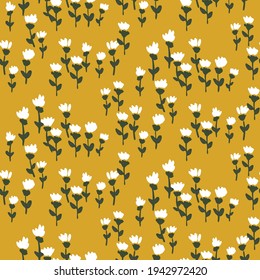 Tiny flowers forming a natural sweet meadow in white, black, and yellow. Adorable one-directional floral seamless vector pattern. Great for home decor, fabric, wallpaper, gift-wrap, stationery, etc.