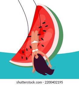 Tiny girl flyes upside down on a swing against the background of a huge watermelon slice, summer mood, summer vibes, organic, healthy food, vitamins, freedom, food, ocean beach, hang on your knees.