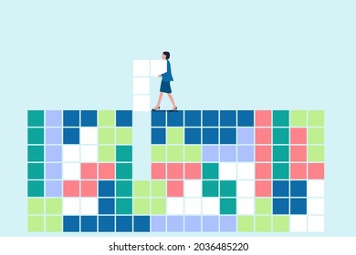 Tiny girl playing Tetris.  Concept of decision making process, logical thinking. find the missing piece of the proposed. Concept puzzle of financial management.