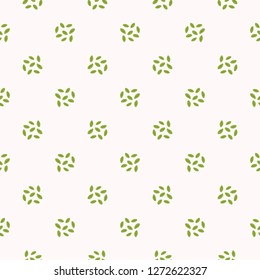 Tiny green leaves polka dots . Hand drawn seamless vector pattern illustration. Simple and elegant trendy garden floral leaf on white background. 
