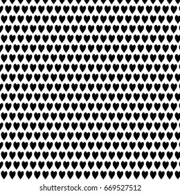 Tiny  heart black color with white background. 