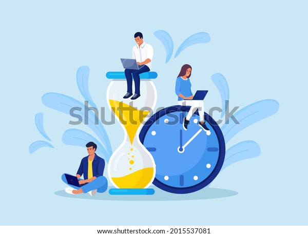 Tiny people and huge hourglass, alarm clock. Team\
working together with laptops. Time management and business\
planning. Time is money.  Deadline. Young employees work near the\
dial of a large watch.