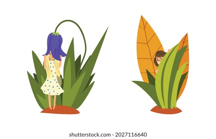 Tiny People in Nature, Cute Fairy Girls Hiding in Tall Grass Cartoon Vector Illustration