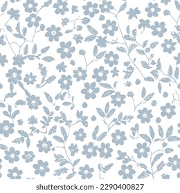 Tiny vintage blue flowers seamless pattern Seamless pattern of flowers and leaves. Floral ornament is arranged in random order.