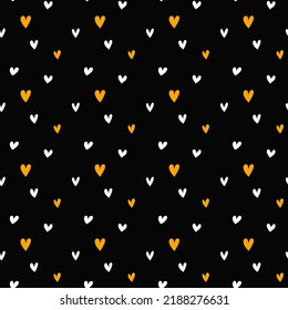 Tiny white and orange hearts on black background. Simple complementary seamless pattern. Halloween vector backdrop for scrapbooking, decoration, textile, wrapping paper, fabric