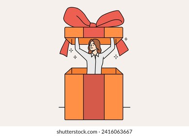 Tiny woman inside gift box with bow, to congratulate store customers or business partners. Girl looks out of present intended for birthday gift or holiday party with surprise for guests