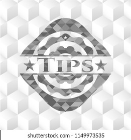 Tips grey badge with geometric cube white background