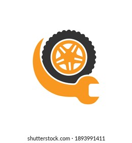 Tire repair shop vector logo design. Wrench and tire icon design.