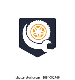 Tire repair shop vector logo design. Wrench and tire icon design.