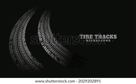 tire track print texture on black background