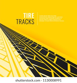 tire tracks in perspective om yellow background