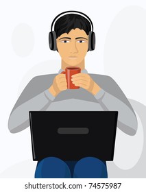 Tired  boy listening to music,  drinking his coffee and working on laptop