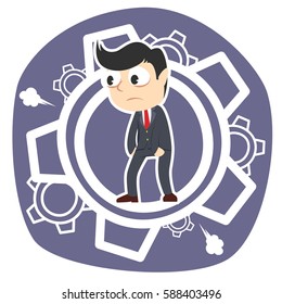 tired businessman inside gears