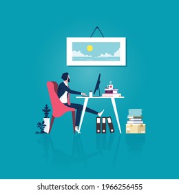 Tired businessman at office desk looking at photograph on wall, Tired worker want to relaxing