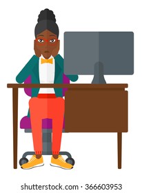 Tired employee sitting in office.