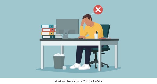 Tired exhausted employee sitting at the office desk, he is unhappy and stressed, job burnout and crisis concept