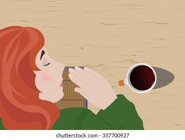 Tired girl sleeping during working hours on the table with a cup of coffee