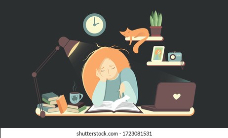 Tired girl studying the night before the exam, she is reading a book, her cat is sleeping
