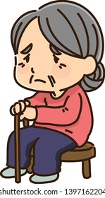 Tired Grandma Sitting On A Chair