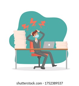 Tired stressed worker is sitting at his desk with lots of work to do