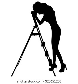 Tired young woman relaxing on ladder