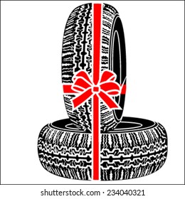 Tires gift with red ribbon
