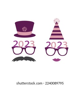 Title: Party glasses and greetings decorated with a hat and stars, ready to be used in New Year's Eve party for 2023.