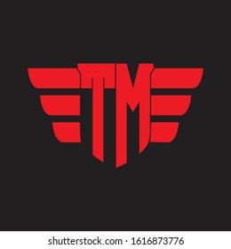 TM Logo monogram with emblem and wings element design template on red colors